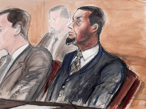 In this Feb. 24, 2016, courtroom file sketch, Tairod Nathan Webster Pugh, right, sits at the defense table with his attorney Zachary S. Taylor, during jury selection in a federal court in the Brooklyn borough of New York. (AP Photo/Elizabeth Williams, File)