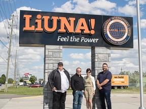 Members with Labourers' International Union of North America (LiUNA) Local 1089 pose with Bluewater Health Foundation Executive Director Kathy Alexander after a $250,000 union donation was announced Wednesday for kids' mental health and addictions at Bluewater Health. LiUNA members with Alexander, from left, are Clarence Fields, executive board member, Mike Maitland, business manager, and Chad Hogan, recording secretary. (Handout)