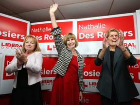 Nathalie Des Rosiers, centre, celebrates her Vanier byelection win with Madeleine Meilleur, left, and Kathleen Wynne in November 2016. A new bill proposed by Des Rosiers states Ottawa would have to have a bylaw on offering city services in English and French, but that really wouldn't change much of anything, writes David Reevely. JEAN LEVAC / POSTMEDIA