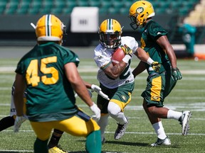 Kendial Lawrence runs the ball during Edmonton Eskimos training camp at Commonwealth Stadium in Edmonton on Monday, May 29, 2017.