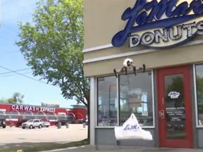 A drone from Drone Dispatch picks up a box of doughnuts from LaMar’s Donuts in Denver. (AP screengrab)