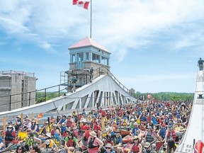A record 138 canoes and kayaks jammed into the Peterborough Lift Lock last year on National Canoe Day. (Special to Postmedia News)