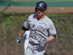 Brett Gardner of the New York Yankees yells as he runs the bases after hitting a three run home ini the ninth inning against the Chicago Cubs at Wrigley Field on May 5, 2017 in Chicago. (JONATHAN DANIEL/Getty Images files)