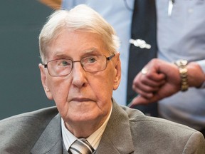 In this June 17, 2016 file photo former SS sergeant Reinhold Hanning who served as a guard at Auschwitz sits in the courtroom in Detmold, Germany. (Bernd Thissen/Pool Photo via AP)