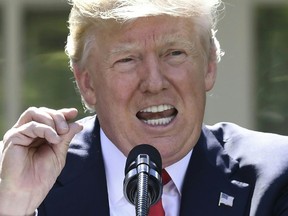 U.S. President Donald Trump announces his decision to withdraw the U.S. from the Paris Climate Accords in the Rose Garden of the White House in Washington, DC, on June 1, 2017. (SAUL LOEB/AFP/Getty Images)