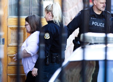 Elizabeth Wettlaufer enters the Provincial courthouse in Woodstock, Ont., on June 1, 2017. THE CANADIAN PRESS/Peter Power