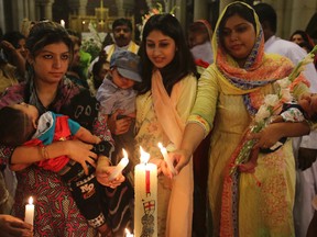 Pakistani Christian women with their children attend a special service to mark Mother's Day at the Anglican Cathedral Church of the Resurrection, in Lahore, Pakistan, on May 14, 2017. (AP Photo/K.M. Chaudary)