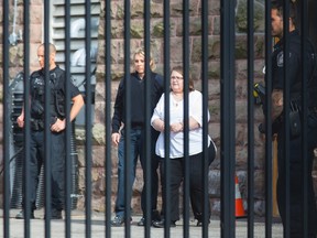 Elizabeth Wettlaufer is escorted from the provincial courthouse in Woodstock on Thursday, June 1, 2017. Wettlaufer pleaded guilty to eight counts of first-degree murder, four counts of attempted murder and two counts of aggravated assault. (THE CANADIAN PRESS/PHOTO)