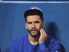 Devon Travis of the Toronto Blue Jays watches from the dugout as his team loses to the New York Yankees at Rogers Centre on June 1, 2017, (TOM SZCZERBOWSKI/Getty Images)