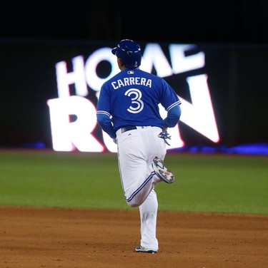 Toronto Blue Jays Ezequiel Carrera LF (3) rounds the bases after smacking a single HR in the seventh inning in Toronto, Ont. on Thursday June 1, 2017. Jack Boland/Toronto Sun/Postmedia Network