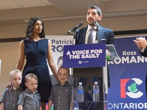 PC's Ross Romano is surrounded by his wife, Heather Mendes, their three children and former PC Leader Patrick Brown as he makes his victory speech after winning the Sault Ste. Marie byelection, Thursday.