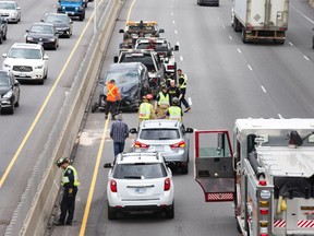 Multiple vehicles involved in an crash on the eastbound Queensway at the Parkdale off ramp ties up morning traffic.