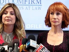 Kathy Griffin (R) and her attorney Lisa Bloom speak during a press conference at The Bloom Firm on June 2, 2017 in Woodland Hills, California. Griffin is holding the press conference after a controversial photoshoot where she was holding a bloodied mask depicting President Donald Trump and to address alleged bullying by the Trump family. (Photo by Frederick M. Brown/Getty Images)
