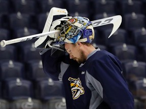 Nashville goaltender Pekka Rinne pauses during practice at Bridgestone Arena on Friday in Nashville. (AP)