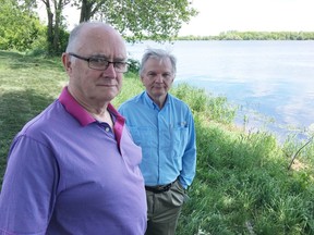 Elliot Ferguson/The Whig-Standard
Derek Complin, left, and Gerald Locklin of No Third Crossing say the city’s case for building a new bridge over the Cataraqui River isn’t as compelling as many people say it is.