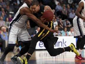 Halifax Hurricanes Kenny Otieno blocks a drive by London Lightning Anthony Criswell during the first half of game 4 of the NBL of Canada final on Thursday June 1, 2017 at the Scotiabank Centre in Halifax, Nova Scotia. (Mike Dembeck, Special to The London Free Press)
