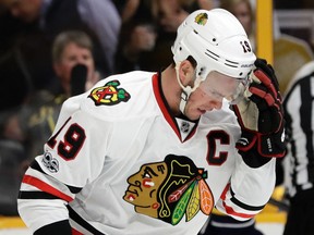 Chicago Blackhawks center Jonathan Toews skates away after being hit with a high stick during the third period in Game 4 of the team's first-round NHL hockey playoff series against the Nashville Predators on Thursday, April 20, 2017, in Nashville, Tenn. (AP Photo/Mark Humphrey)