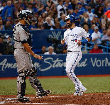 Toronto Blue Jays Jose Bautista RF (19) tots home for a run in the third inning  in Toronto, Ont. on Friday June 2, 2017. Jack Boland/Toronto Sun/Postmedia Network