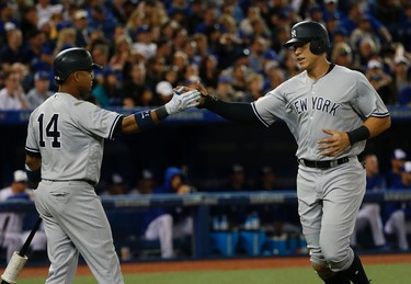 New York Yankees Matt Holliday DH (17) smashes a double to centre scoring Aaron Judge in the seventh inning in Toronto, Ont. on Friday June 2, 2017. Jack Boland/Toronto Sun/Postmedia Network