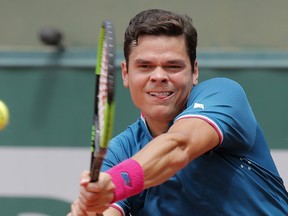 Canada's Milos Raonic plays a shot against Spain's Guillermo Garcia-Lopez during their third round match at the French Open in Paris, France, on Friday, June 2, 2017. (Michel Euler/AP Photo)