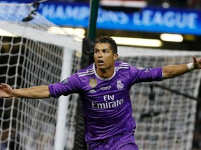 Real Madrid’s Cristiano Ronaldo celebrates after scoring during the Champions League final at the Millennium Stadium in Cardiff, Wales, Saturday June 3, 2017. (AP Photo/Kirsty Wigglesworth)