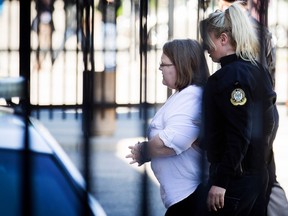 Elizabeth Wettlaufer enters the Provincial courthouse in Woodstock, Ontario on June 1, 2017.