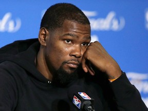 Kevin Durant answers questions after Game 1 of the NBA Finals against the Cleveland Cavaliers Thursday, June 1, 2017, in Oakland, Calif. (AP Photo/Ben Margot)