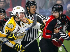Brandon Wheat Kings’ Nolan Patrick, left, and Rouyn-Noranda Huskies’ Anthony-John Greer are separated as they scuffle during the Memorial Cup in Red Deer, Saturday, May 21, 2016. (THE CANADIAN PRESS/Jeff McIntosh)
