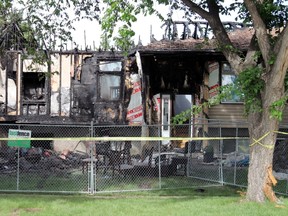 A vehicle crashed into a  house and caught fire, which spread to the home, around 2:30 a.m. on Saturday in Stony Plain on Oatway Drive. JESSE COLE/Postmedia