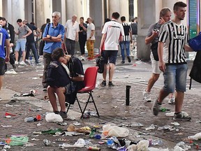 Juventus fans leave San Carlo's square at the end of the Champions League final soccer match between Juventus and Real Madrid, in Turin, Italy, Saturday, June 3, 2017.  (Alessandro Di Marco/ANSA via AP)