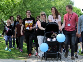 Meaghan Edwards, third from right, and about 150 other people participated in the Brain Injury Group (BIG) Walk on Sunday, June 4, 2017 in Stratford, Ont. The inaugural event was held to raise awareness about brain injuries and a monthly support group in Stratford. Terry Bridge/Beacon Herald/Postmedia Network