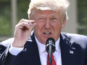 US President Donald Trump announces his decision to withdraw the US from the Paris Climate Accords, in the Rose Garden of the White House in Washington, DC. on June 1, 2017. (AFP/Getty Images)