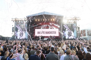 In this handout provided by One Love Manchester benefit concert Ariana Grande performs on stage on June 4, 2017 in Manchester, England. (Getty Images/Dave Hogan for One Love Manchester)