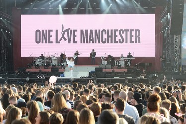 In this handout provided by 'One Love Manchester' benefit concert Miley Cyrus performs on stage on June 4, 2017 in Manchester, England. (Getty Images/Dave Hogan for One Love Manchester)