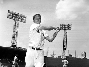 In this June 4, 1952, file photo, Jim Piersall of the Boston Red Sox poses at Fenway Park in Boston before a game against the Cleveland Indians. Piersall, who bared his soul about his struggles with mental illness in his book "Fear Strikes Out," has died. (P.J. Carroll/AP Photo/Files)