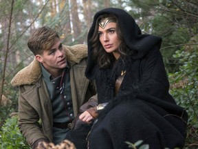 This image released by Warner Bros. Pictures shows Chris Pine, left, and Gal Gadot in a scene from, "Wonder Woman." (Clay Enos/Warner Bros. Pictures via AP)