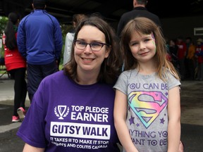 Laura Carter with her daughter Daphne prior to the Gutsy Walk for Crohn's and Colitis Canada at Lake Ontario Park on Sunday. Laura is president of the local chapter of Crohn's and Colitis Canada and has lived with Crohn's for 17 years. (Steph Crosier/The Whig-Standard)