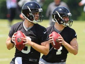 QB Austin Trainor, left, and Alek Torgersen look to pass during Atlanta Falcons rookie minicamp at Flowery Branch, Ga., on May 12.