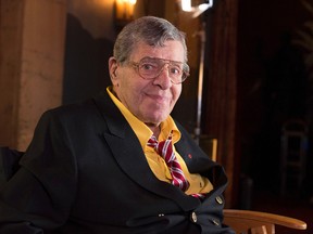 In this April 12, 2014 file photo, actor and comedian Jerry Lewis poses during an interview at TCL Chinese Theatre in Los Angeles. A publicist for Lewis says the comedian is recovering after being treated at a Las Vegas hospital for a urinary tract infection. The 91-year-old comedian was taken to the hospital on Friday, June 2, 2017, so that he could get antibiotics immediately to treat the condition. Publicist Candi Cazau says he is doing fine and is expected to be released shortly. (Photo by Dan Steinberg/Invision/AP, File)