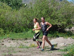 Rappelling down rocks, jumping across tires, and navigating tricky terrain? It's not boot camp, just another year at the Wild Rose Rough Runner.