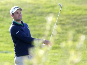 Corey Conners competes during the ATB Financial Classic at Glen Eagles Golf Club in Cochrane, Alta., on July 31, 2015. (Leah Hennel/Calgary Herald)