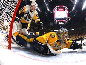 Pekka Rinne of the Nashville Predators makes a glove save against Jake Guentzel of the Pittsburgh Penguins during the second period in Game 4 of the Stanley Cup final at the Bridgestone Arena on June 5, 2017. (Bruce Bennett/Getty Images)