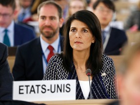 United States permanent Representative to the United Nations Ambassador Nikki Haley waits before delivering a speech about the current humanitarian situation in the world, during the opening of the 35th session of the Human Rights Council, at the European headquarters of the United Nations in Geneva, Switzerland, Tuesday, June 6, 2017. (Magali Girardin/Keystone via AP)