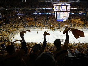 Nashville Predators fans cheer in the final moments of the third period in Game 4 of the NHL hockey Stanley Cup Finals against the Pittsburgh Penguins Monday, June 5, 2017, in Nashville, Tenn. The Predators won 4-1 to tie the series 2-2.