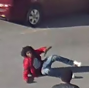 Ahmed Siyad, 24, falls to the ground after being wounded in an April 23, 2017 gun battle.
