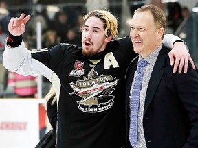 Trenton Golden Hawks GM-coach Jerome Dupont celebrates the club's 2017 Dudley Hewitt Cup championship game victory with TGH player Jeremy Pullara at Community Gardens. (Amy Deroche/OJHL Images)