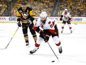 Derick Brassard of the Ottawa Senators skates with the puck against Evgeni Malkin of the Pittsburgh Penguins in Game 5 of the Eastern Conference final during the Stanley Cup playoffs at PPG Paints Arena on May 21, 2017. (Gregory Shamus/Getty Images)