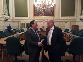 Nickel Belt MP Marc Serre chakes hands with Dr. Granger Avery, president of the Canadian Medical Association, in Ottawa. Photo supplied