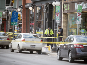 Ottawa Police and the SIU are investigating two fatalities in Ottawa's downtown Saturday June 3, 2017. Ottawa Police officers on Dalhousie between Murray and Clarence.  (Ashley Fraser/Postmedia)