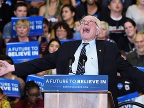 Then-Democratic presidential candidate Sen. Bernie Sanders (D-VT) jokes around as he speaks during a campaign rally at Bonanza High School on Feb. 14, 2016 in Las Vegas.  (Ethan Miller/Getty Images)